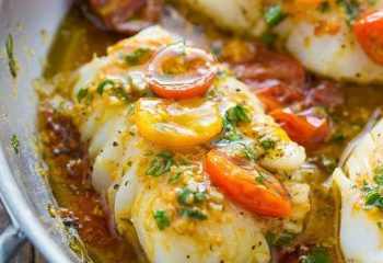 Baked cod in white wine tomato basil sauce