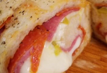 Pepperoni, spinach and hot pepper stromboli